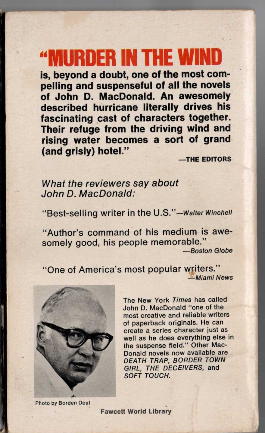 John D. MacDonald  MURDER IN HE WIND magnified rear book cover image