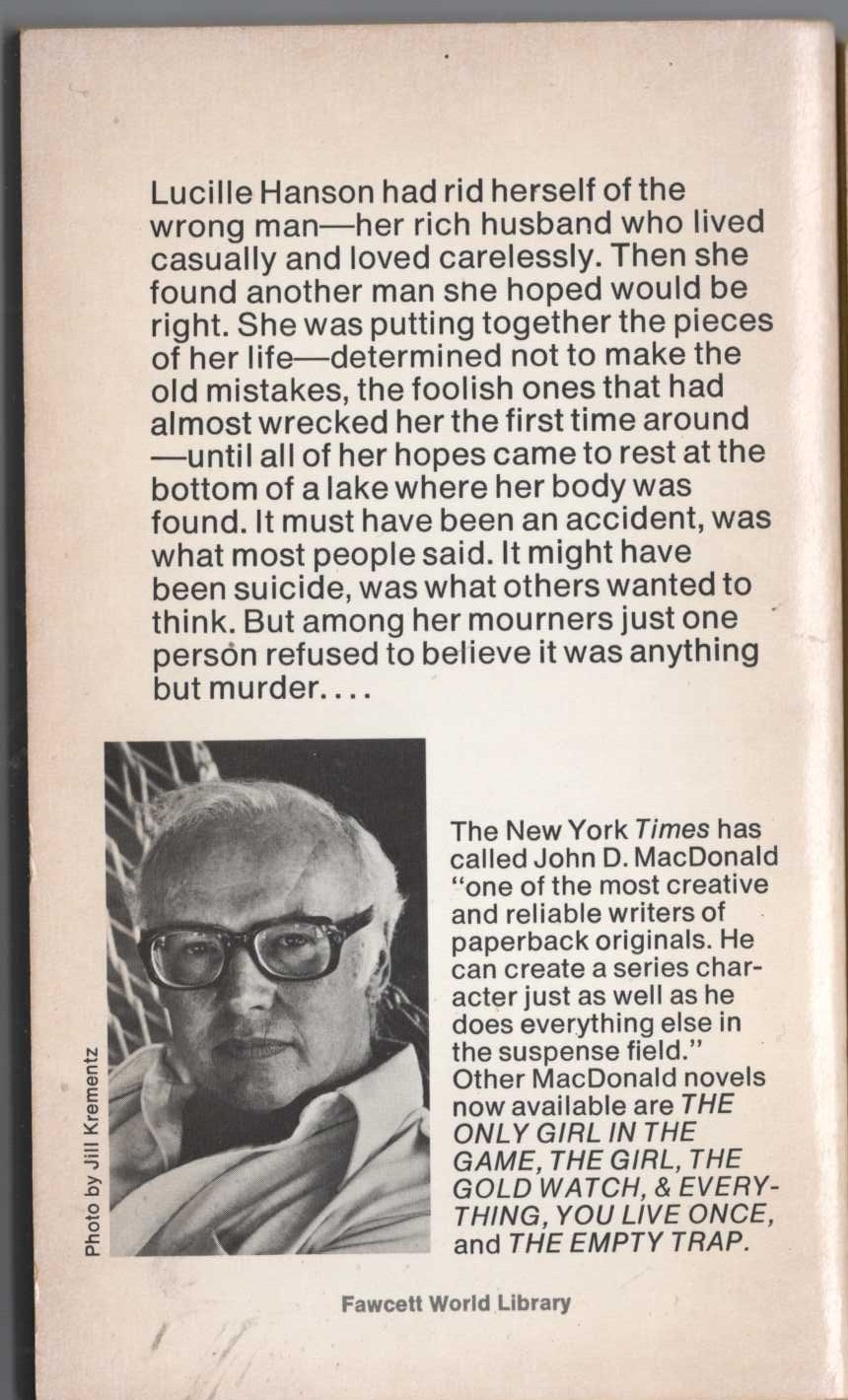 John D. MacDonald  THE DROWNER magnified rear book cover image