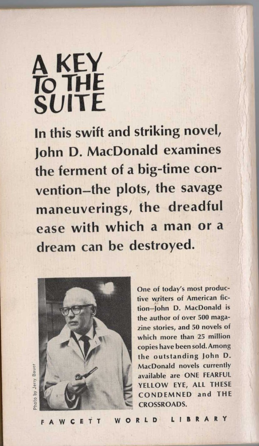 John D. MacDonald  A KEY TO THE SUITE magnified rear book cover image