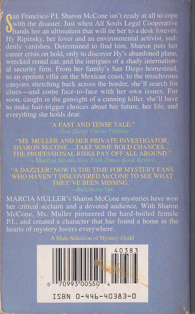 Marcia Muller  WOLF IN THE SHADOWS magnified rear book cover image