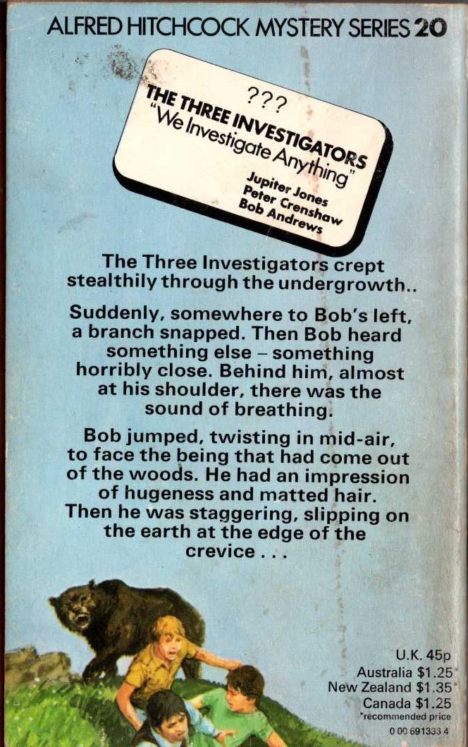 Alfred Hitchcock (introduces_The_Three_Investigators) THE MYSTERY OF MONSTER MOUNTAIN magnified rear book cover image