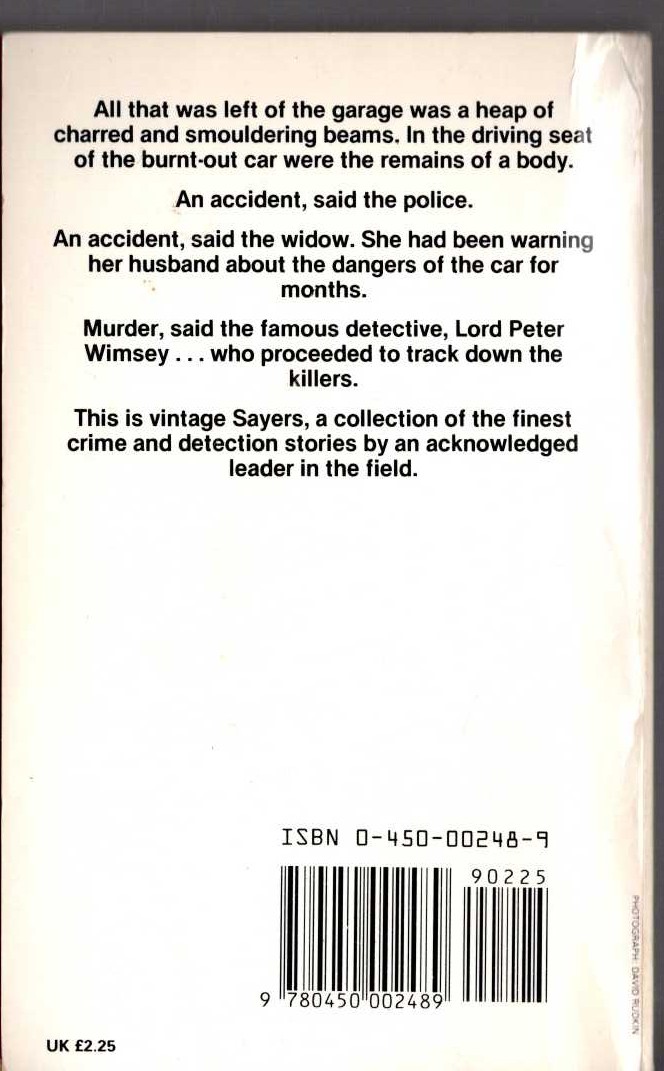 Dorothy L. Sayers  IN THE TEETH OF THE EVIDENCE magnified rear book cover image