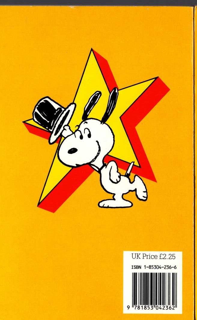 Charles M. Schulz  SNOOPY STARS AS THE ENTERTAINER magnified rear book cover image