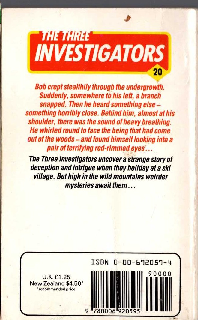 Alfred Hitchcock (introduces_The_Three_Investigators) THE MYSTERY OF MONSTER MOUNTAIN magnified rear book cover image