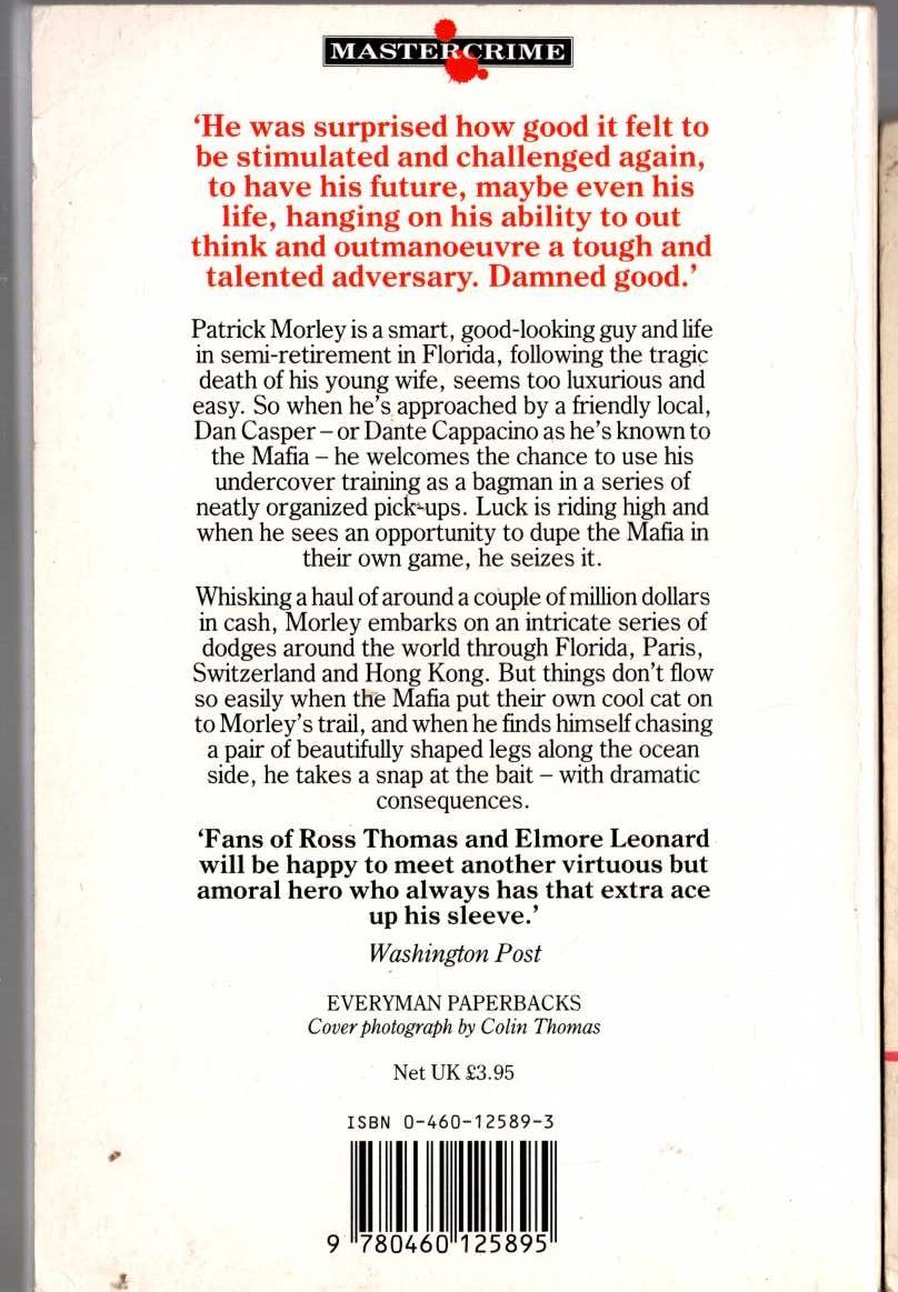 James Burke  A PRESENT FOR SANTA magnified rear book cover image