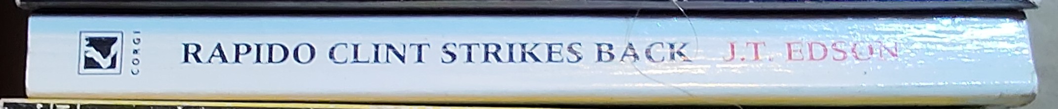 J.T. Edson  RAPIDO CLINT STRIKES BACK spine of book image