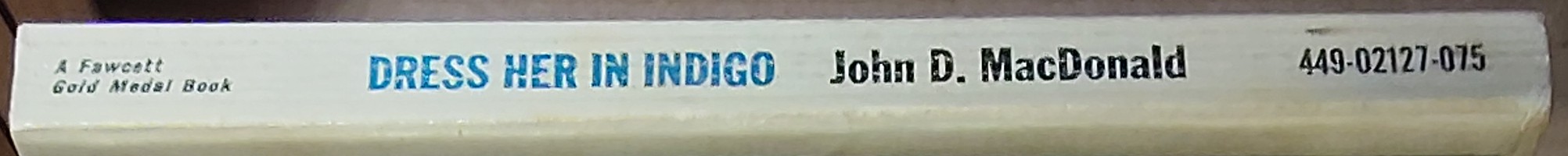 John D. MacDonald  DRESS HER IN INDIGO spine of book image