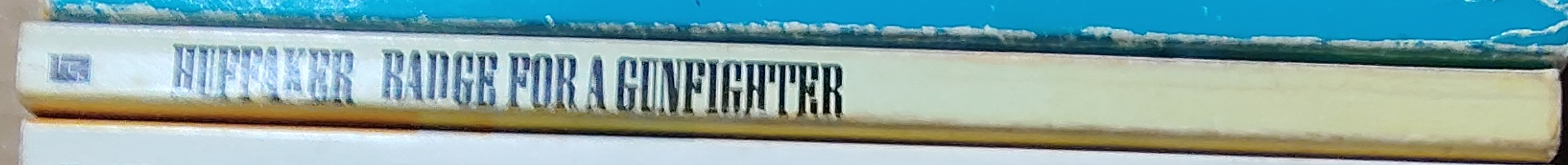 Huffaker   BADGE FOR A GUNFIGHTER spine of book image