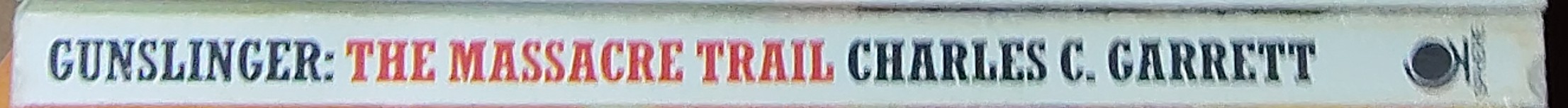 Charles C. Garrett  GUNSLINGER: THE MASSACRE TRAIL spine of book image