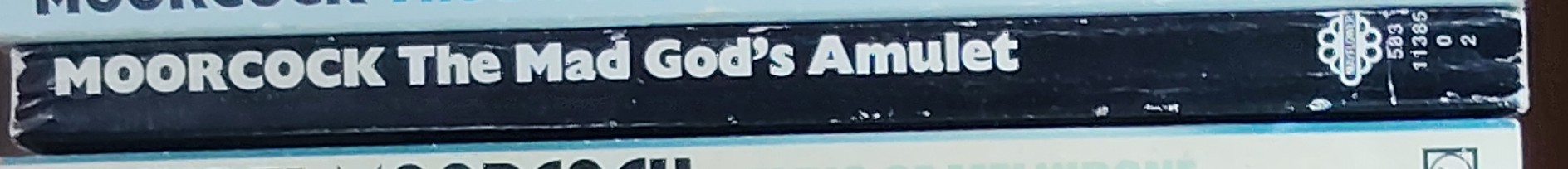 Michael Moorcock  THE MAD GOD'S AMULET spine of book image