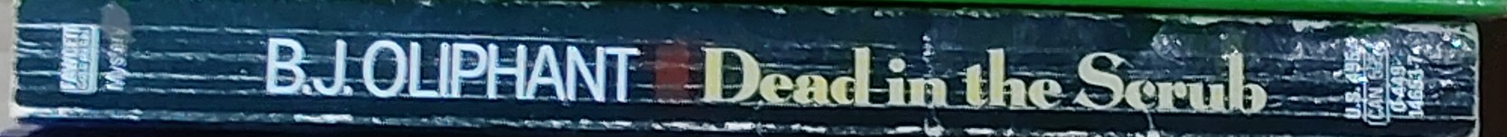 B.J. Oliphant  DEAD IN THE SCRUB spine of book image