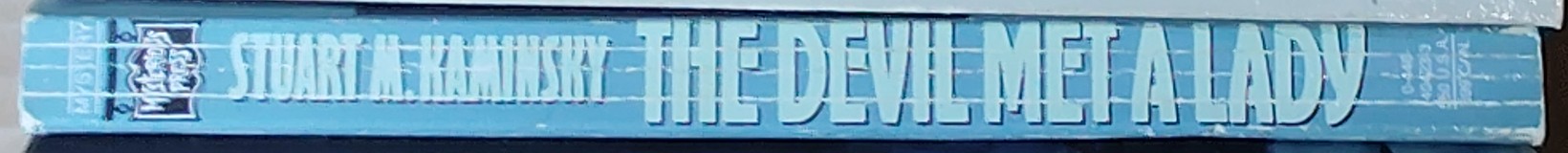 Stuart M. Kaminsky  THE DEVIL MET A LADY spine of book image