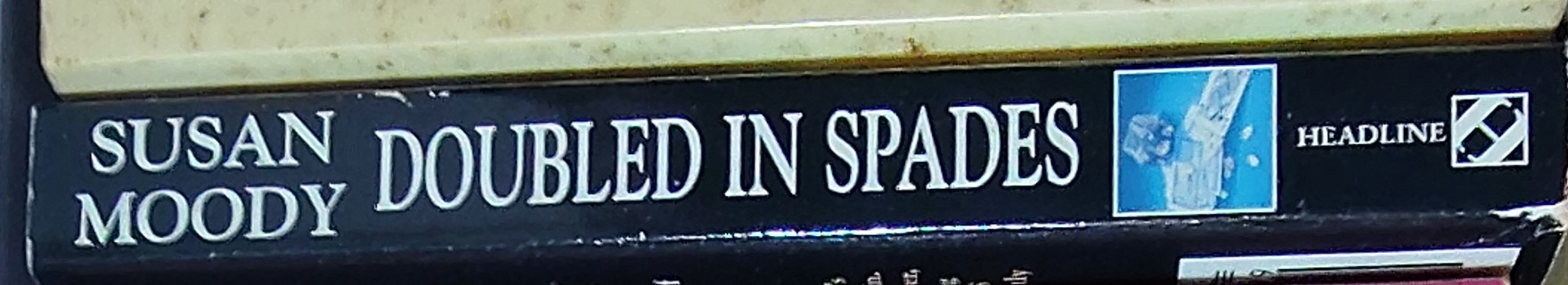 Susan Moody  DOUBLED IN SPADES spine of book image