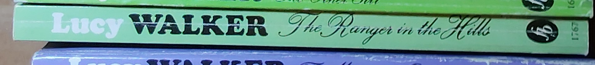 Lucy Walker  THE RANGER IN THE HILLS spine of book image