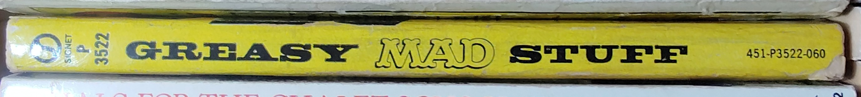 Books Mad  WE'RE STILL USING THAT GREASY MAD STUFF spine of book image