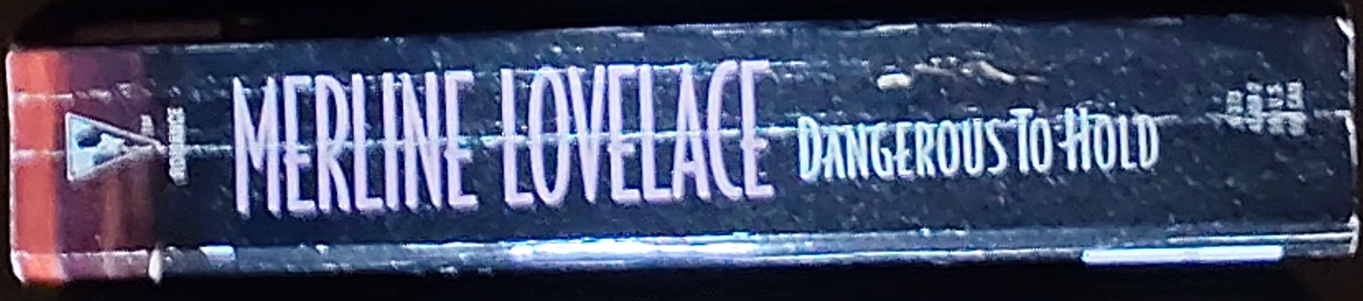 Merline Lovelace  DANGEROUS TO HOLD: NIGHT OF THE JAGUAR and THE COWBOY AND THE COSSACK spine of book image