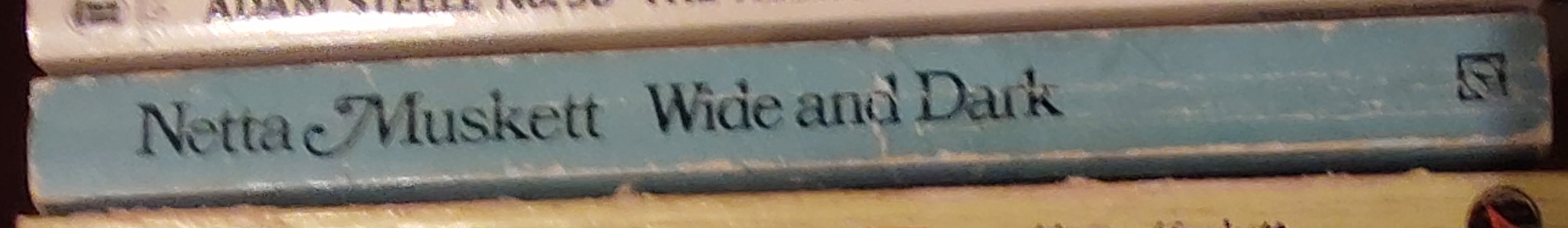 Netta Muskett  WIDE AND DARK spine of book image