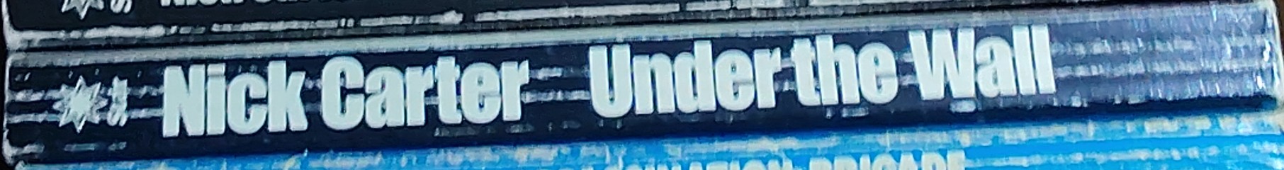 Nick Carter  UNDER THE WALL spine of book image