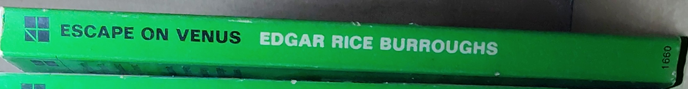 Edgar Rice Burroughs  ESCAPE ON VENUS spine of book image