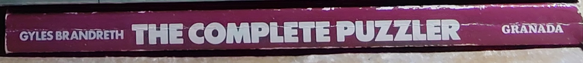 Gyles Brandreth  THE COMPLETE PUZZLER spine of book image