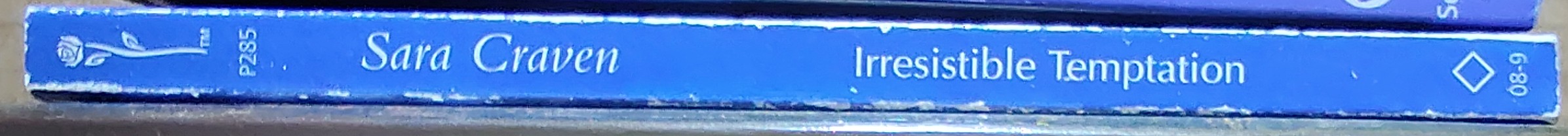 Sara Craven  IRRESISTIBLE TEMPTATION spine of book image