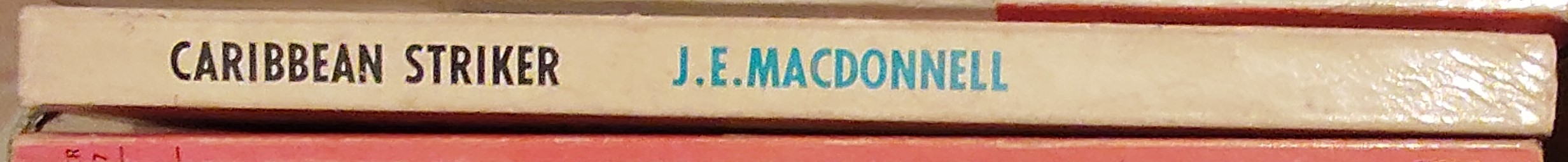 J.E. Macdonnell  CARIBBEAN STRIKER spine of book image