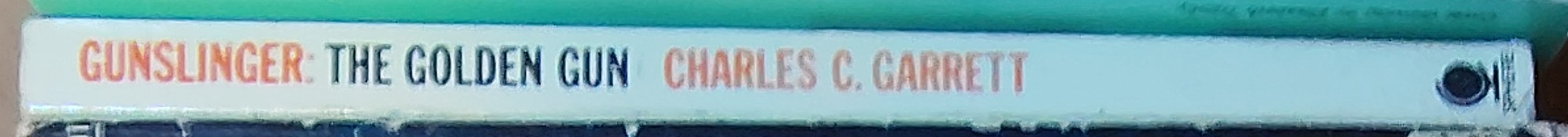 Charles C. Garrett  GUNSLINGER: THE GOLDEN GUN spine of book image